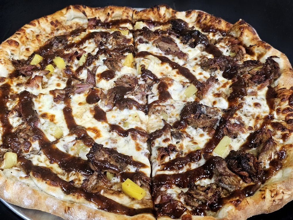 BBQ sauce drizzle on pizza